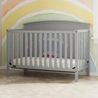 Pebble gray crib in nursery