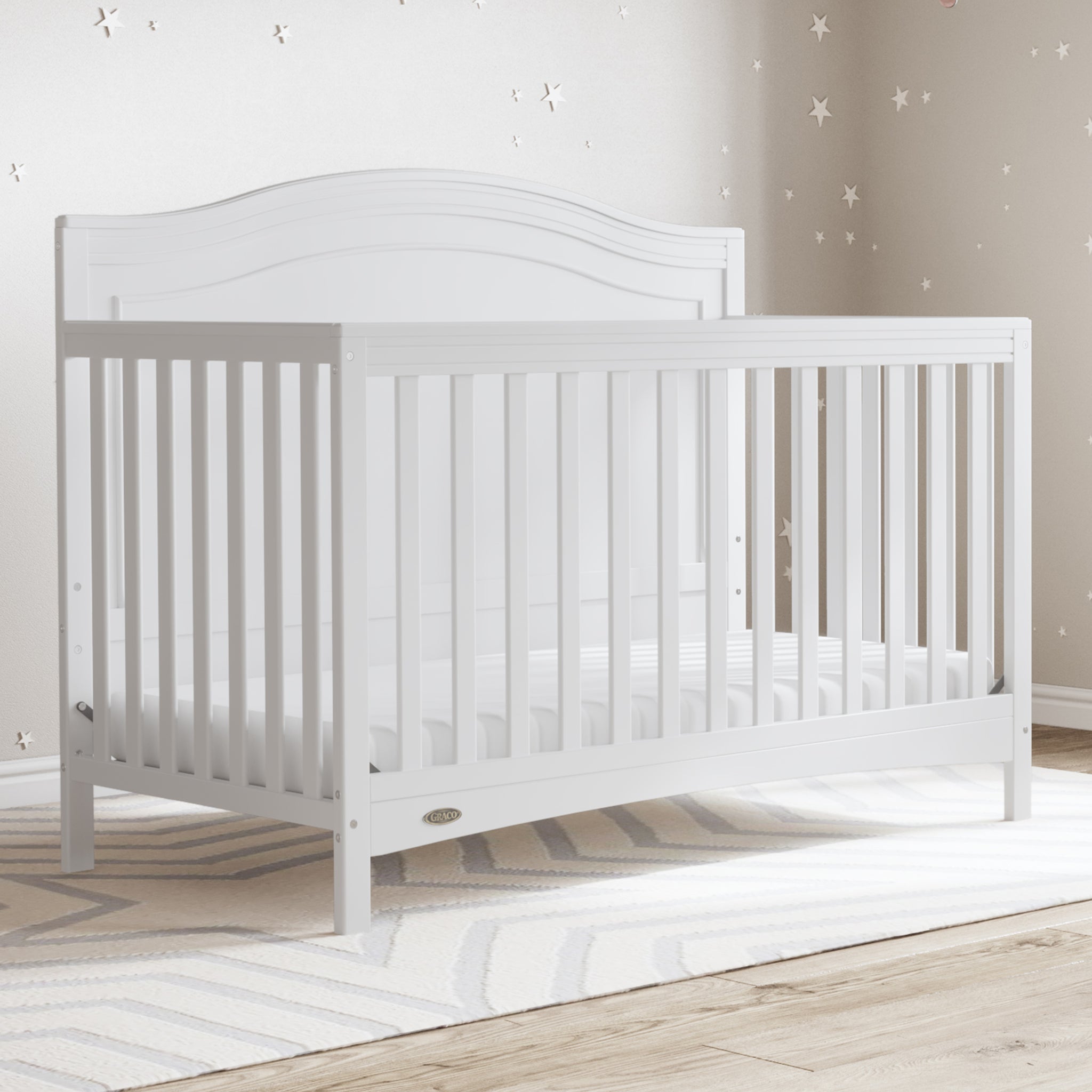 White crib in nursery