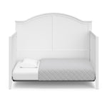 White crib in toddler bed conversion