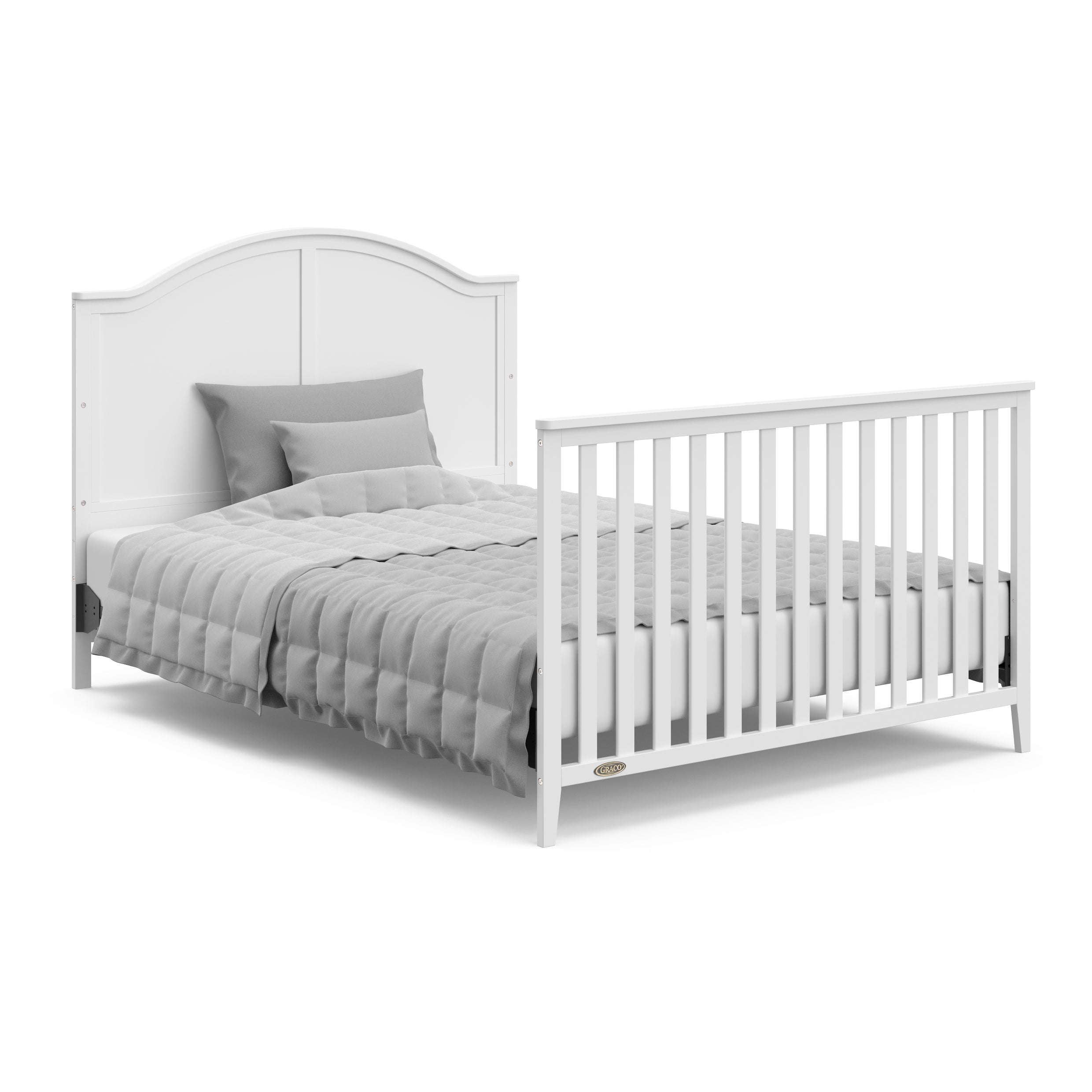 White crib in full-size bed with headboard and footboard conversion