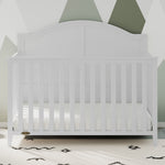White crib in nursery