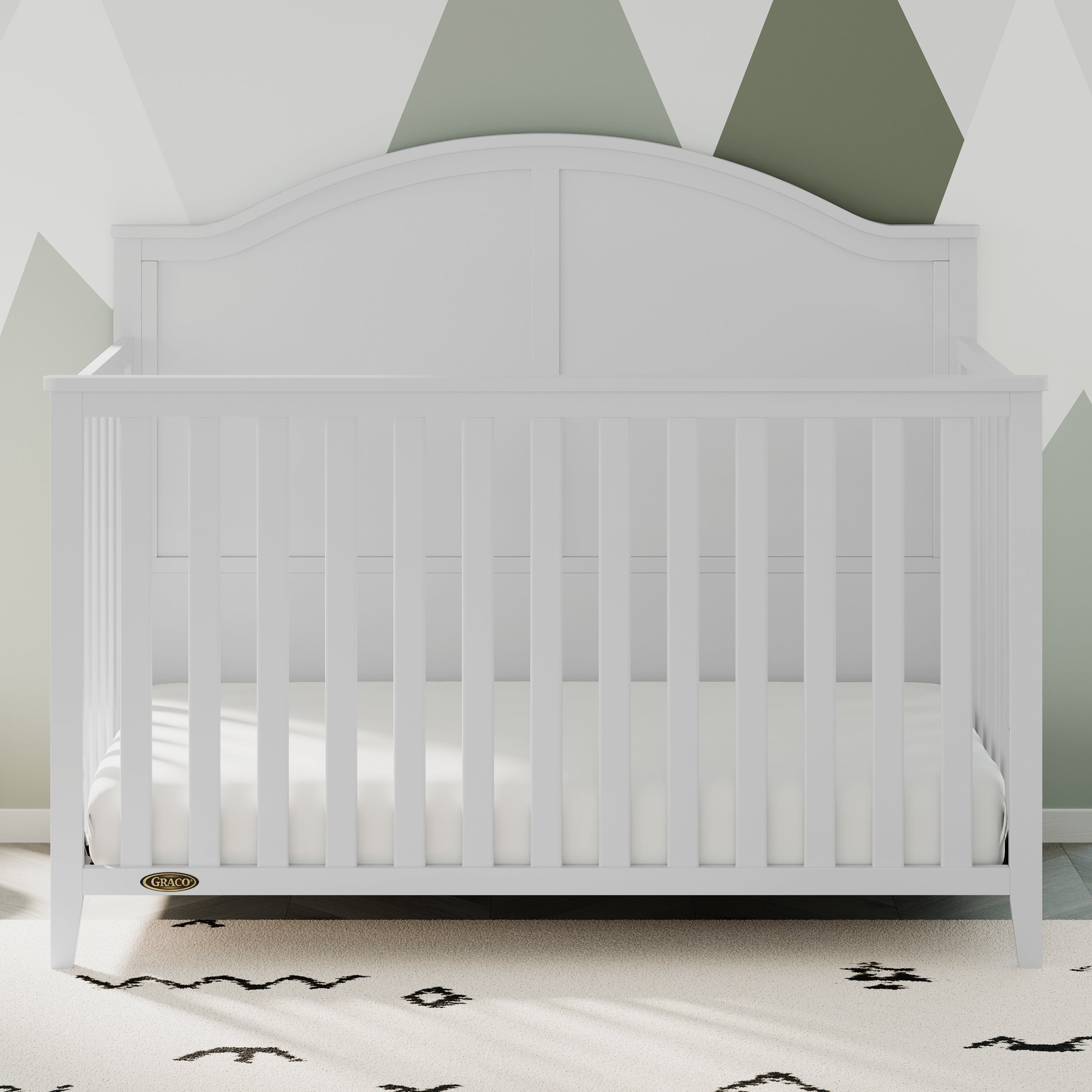 White crib in nursery