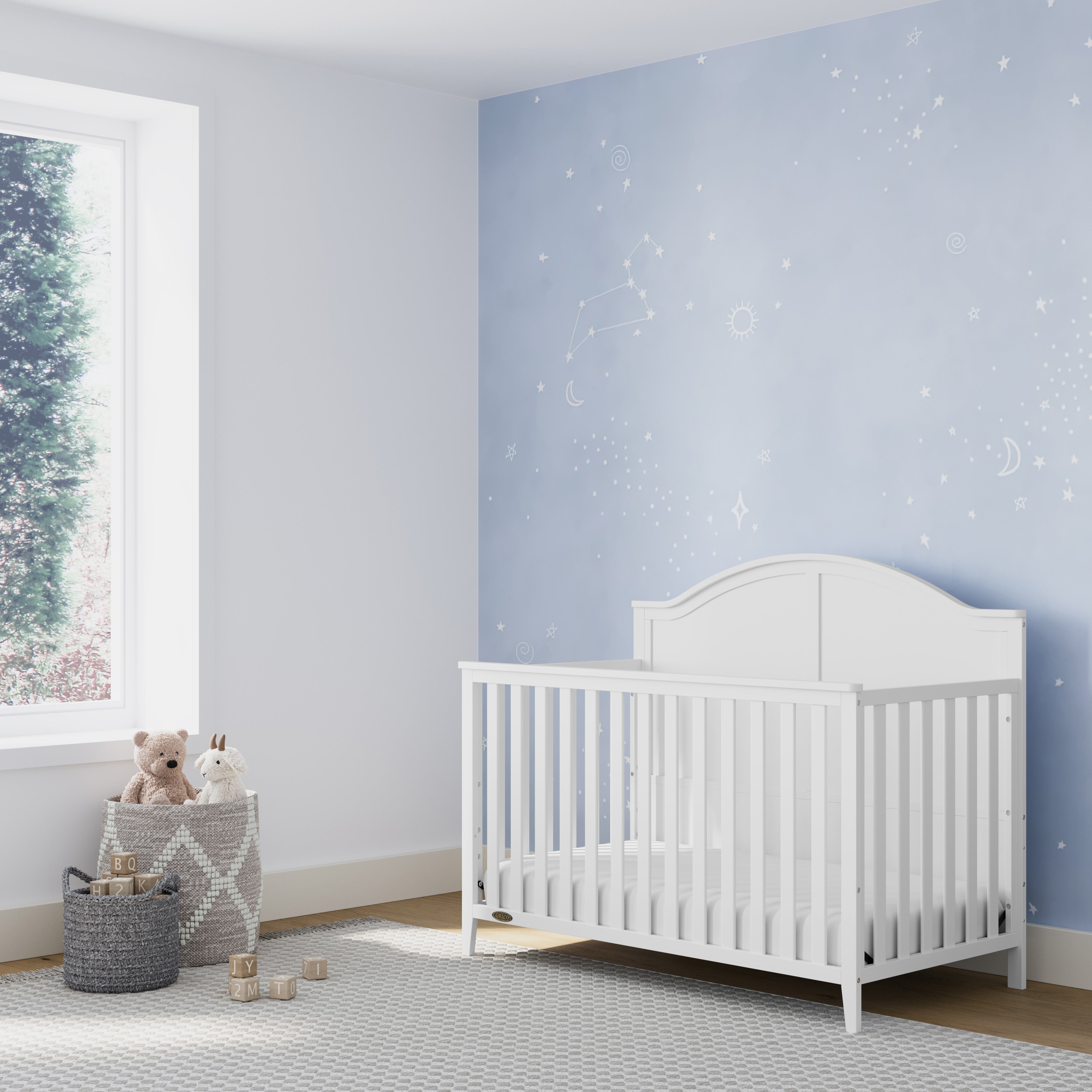 White crib in nursery
