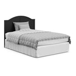 black crib in full-size bed with headboard conversion