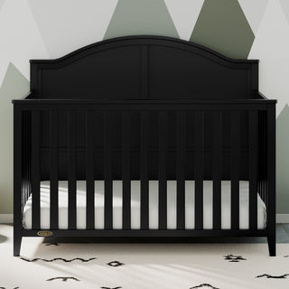 black crib in nursery