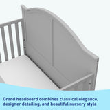 Close-up view of pebble gray crib's headboard