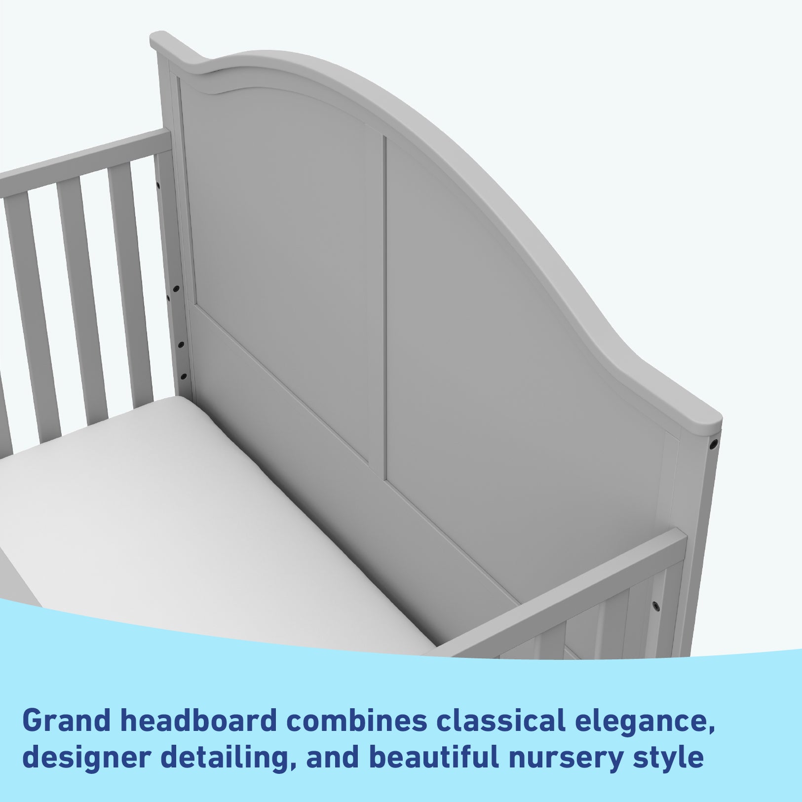 Close-up view of pebble gray crib's headboard