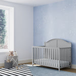 Pebble gray crib in nursery