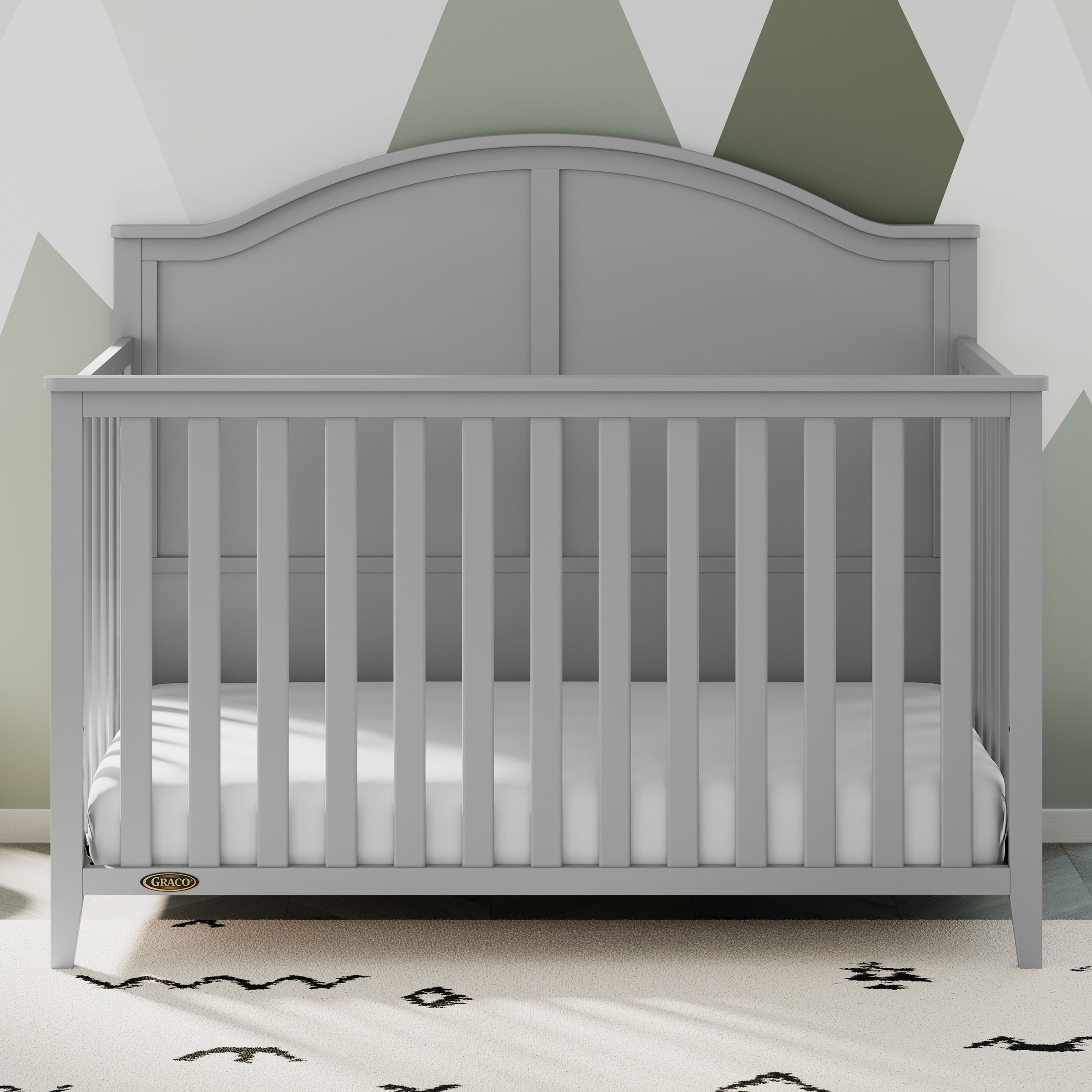 Pebble gray crib in nursery