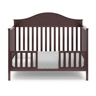 espresso in toddler bed conversion with two safety guardrails