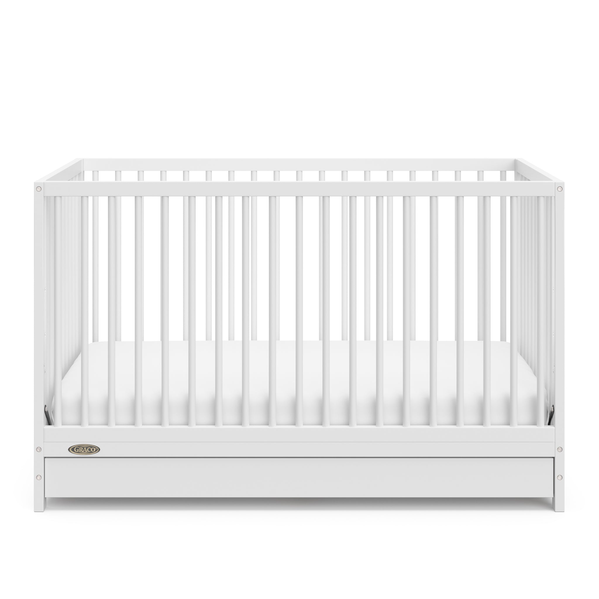 White crib with drawer angled