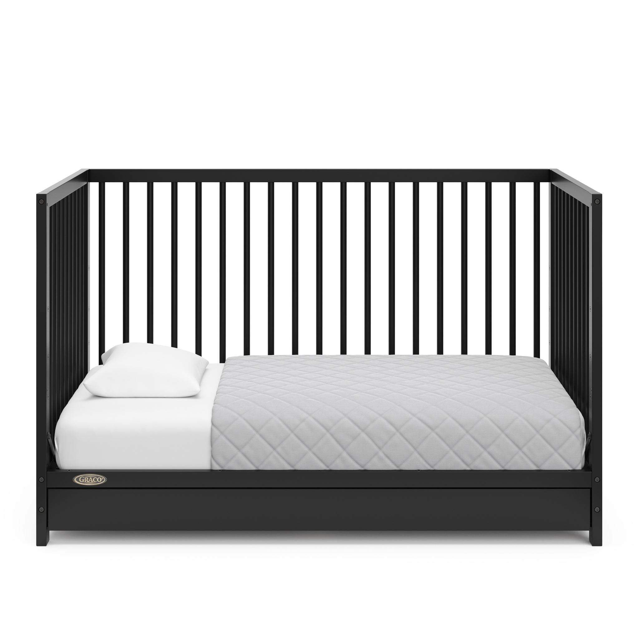 Black crib with drawer in toddler bed conversion