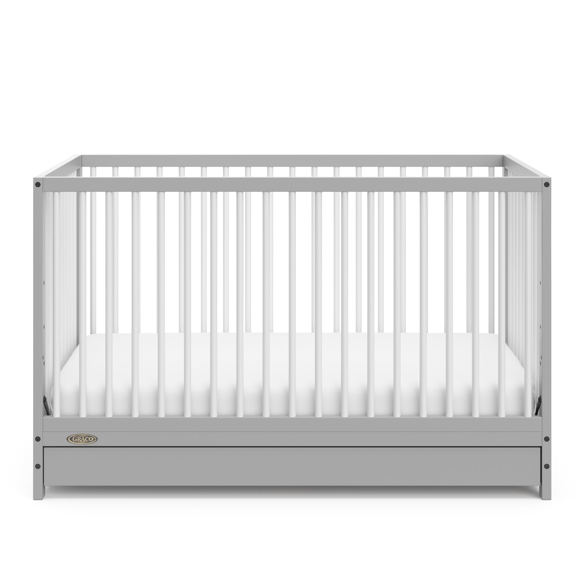 Front view of Pebble gray crib with open drawer