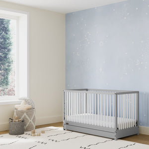 Pebble gray with white crib with drawer in nursery