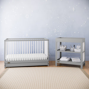 Pebble gray with white crib with drawer in nursery