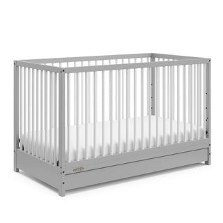 Pebble gray with white crib with drawer angled