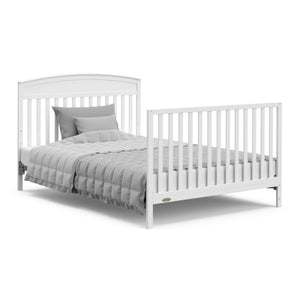 White crib with drawer in full-size bed with headboard and footboard conversion