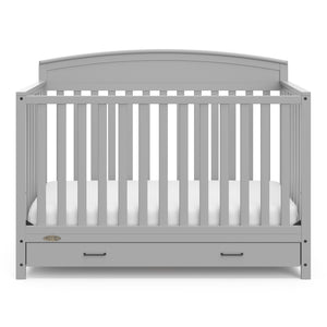 Front view of Pebble gray crib with drawer