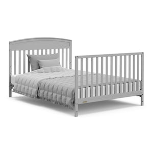 Pebble gray crib with drawer in full-size bed with headboard and footboard conversion