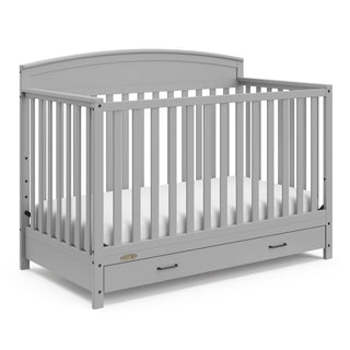 Pebble gray crib with drawer angled