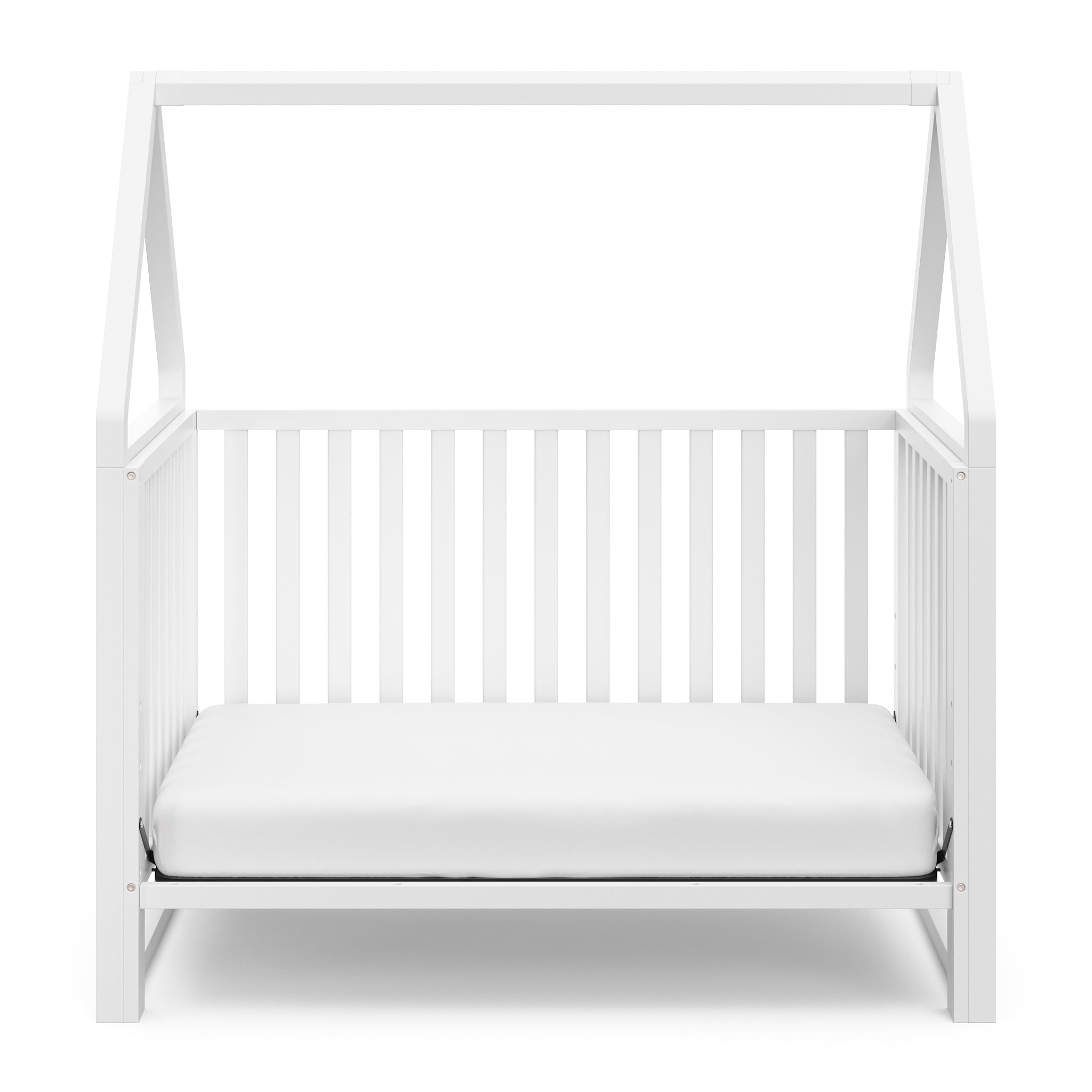 White crib in toddler bed conversion 