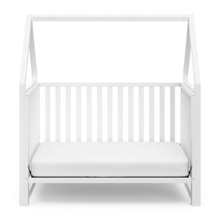 White crib in toddler bed conversion 