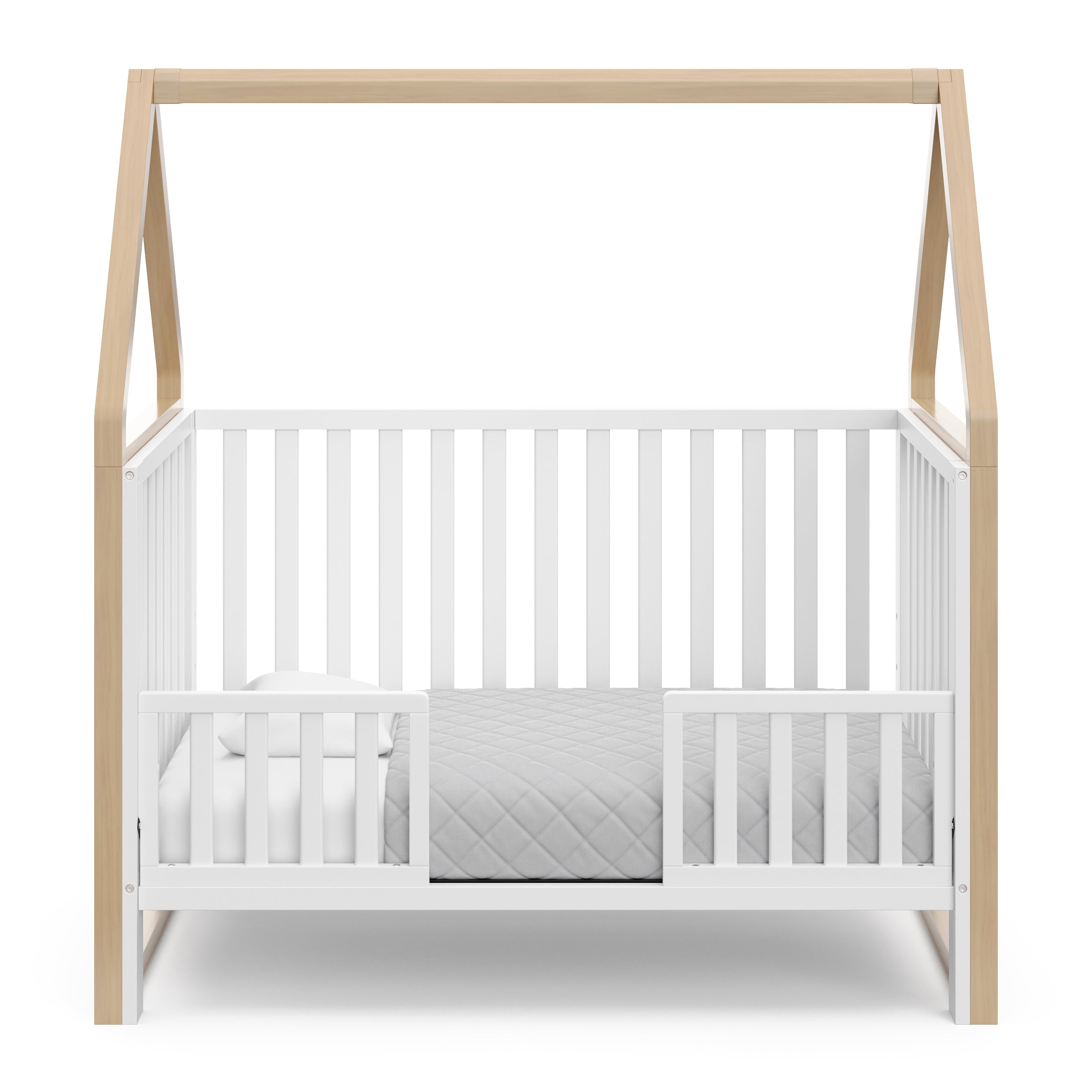 Storkcraft® Orchard 6-in-1 Convertible Canopy Crib.