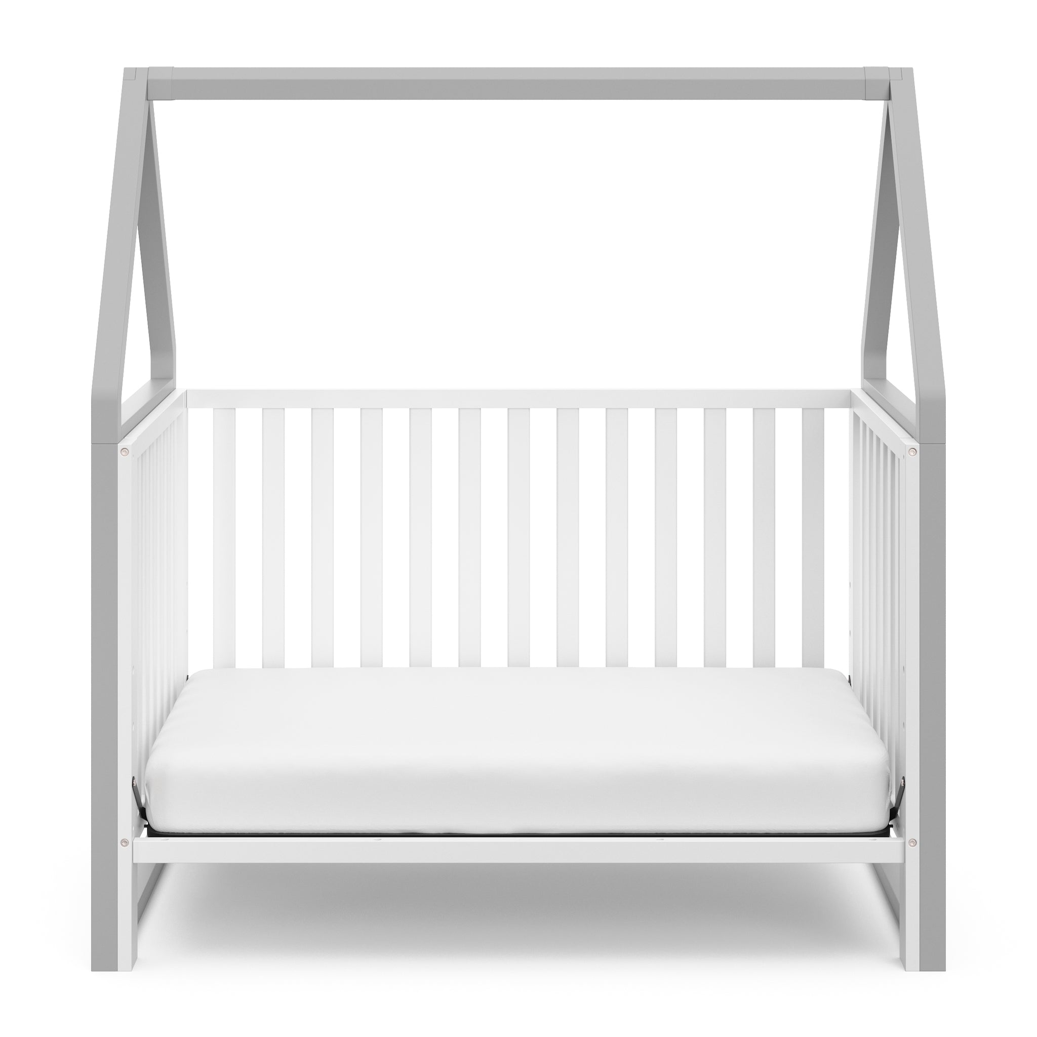 White crib with pebble gray in toddler bed conversion 