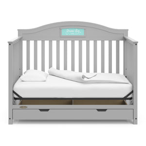Pebble gray crib with drawer in daybed conversion