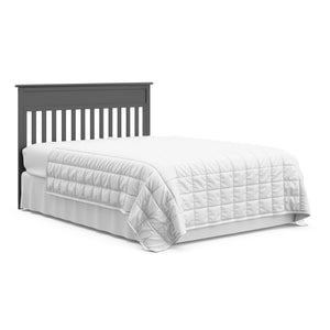 gray crib and changer with drawer in full-size bed with headboard conversion