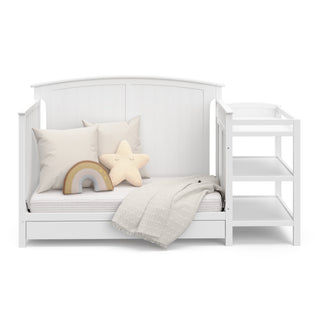 white crib and changer in daybed conversion