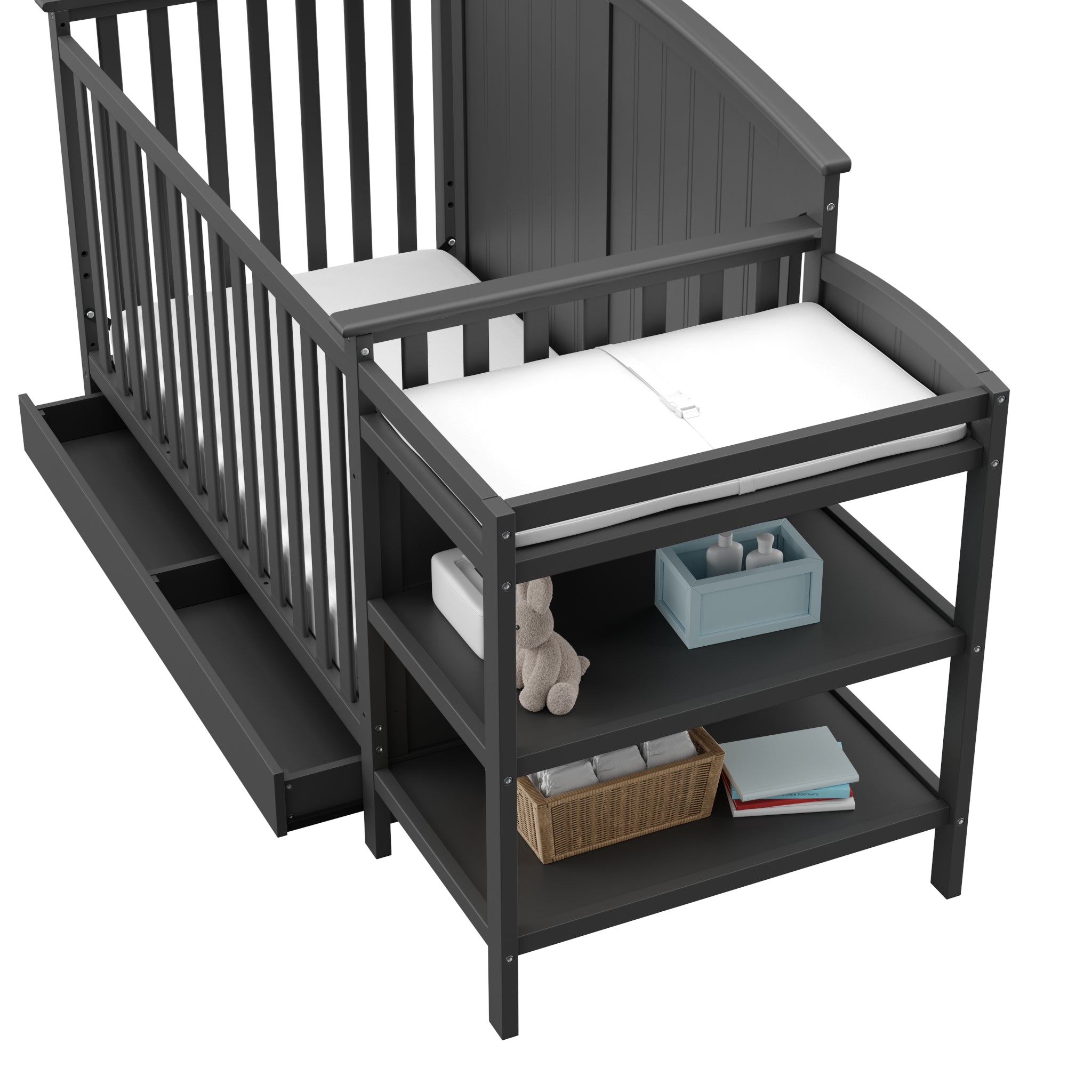 Close-up view of gray crib and changer 