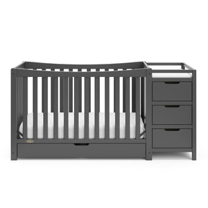 Front view of gray crib with drawer and changer with drawer