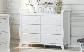 White 6 drawer dresser in nursery