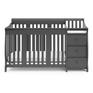Front view of gray crib and changer 