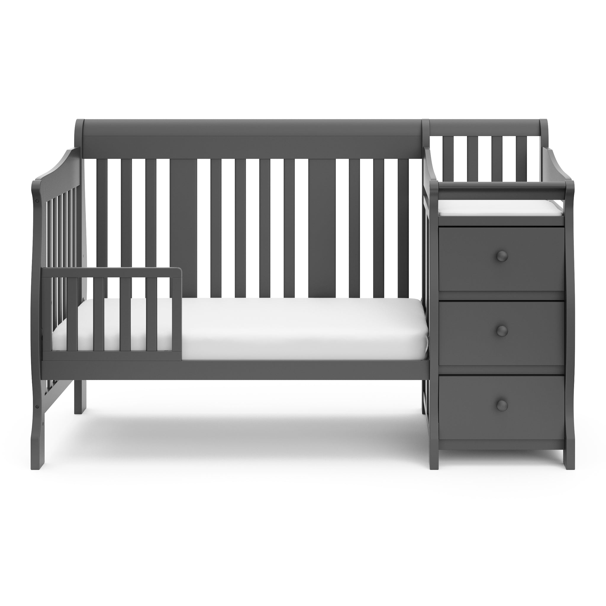 crib in toddler bed conversion with one safety guardrail 