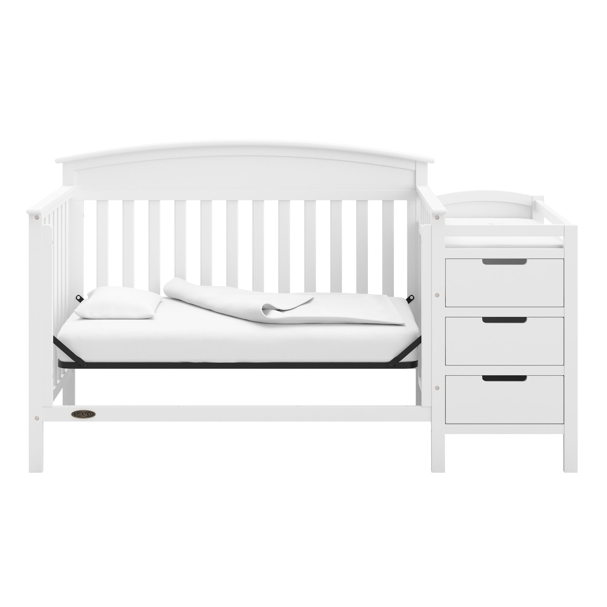 White crib and changer in daybed conversion