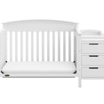 White crib and changer in toddler bed conversion