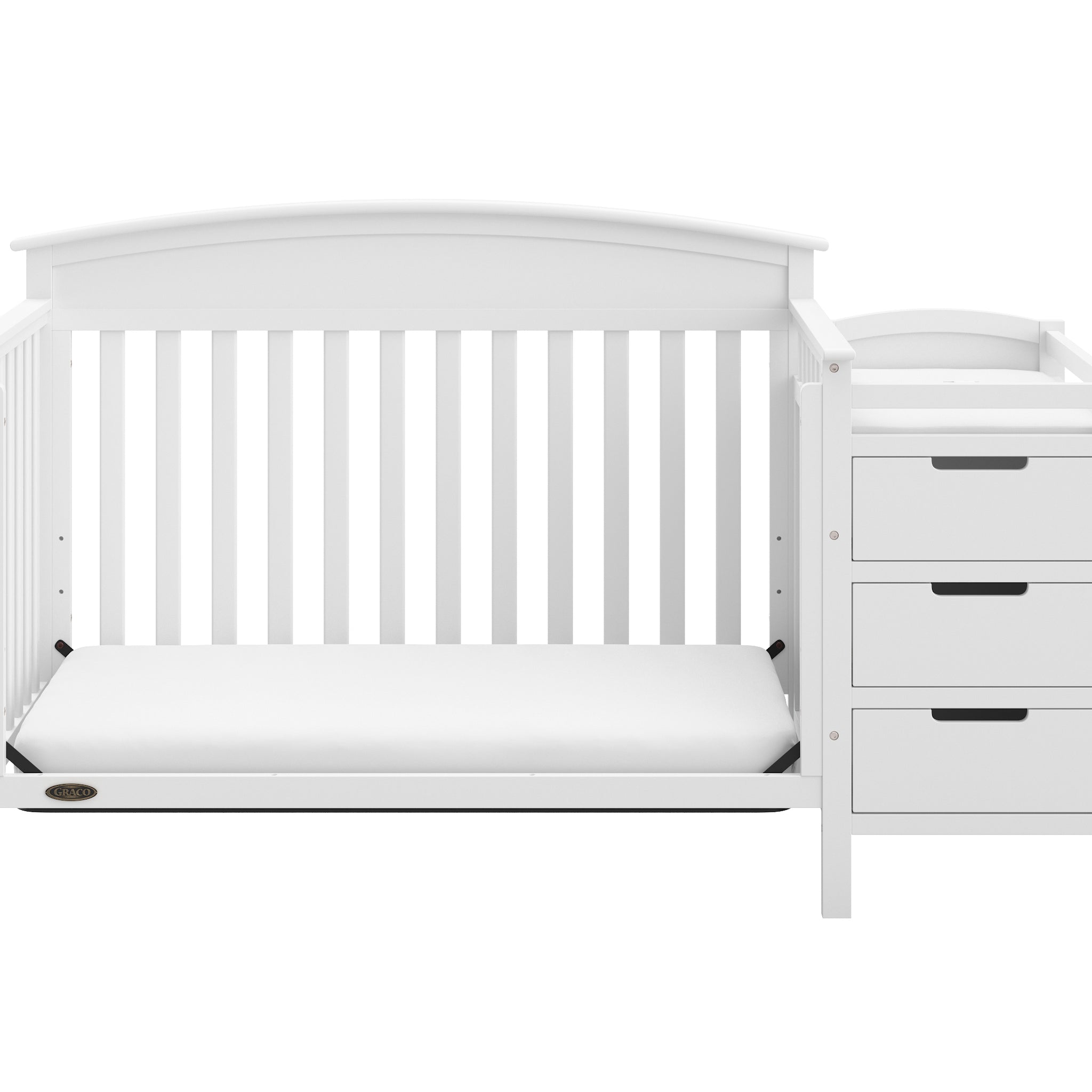 White crib and changer in toddler bed conversion