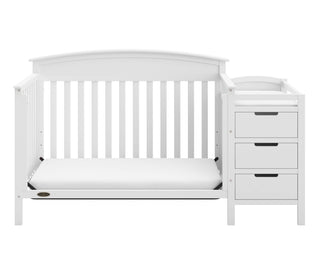 White crib and changer in toddler bed conversion