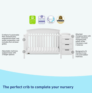 White crib and changer features graphic