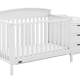 White crib and changer angled