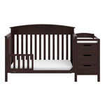 espresso crib in toddler bed conversion with one safety guardrail