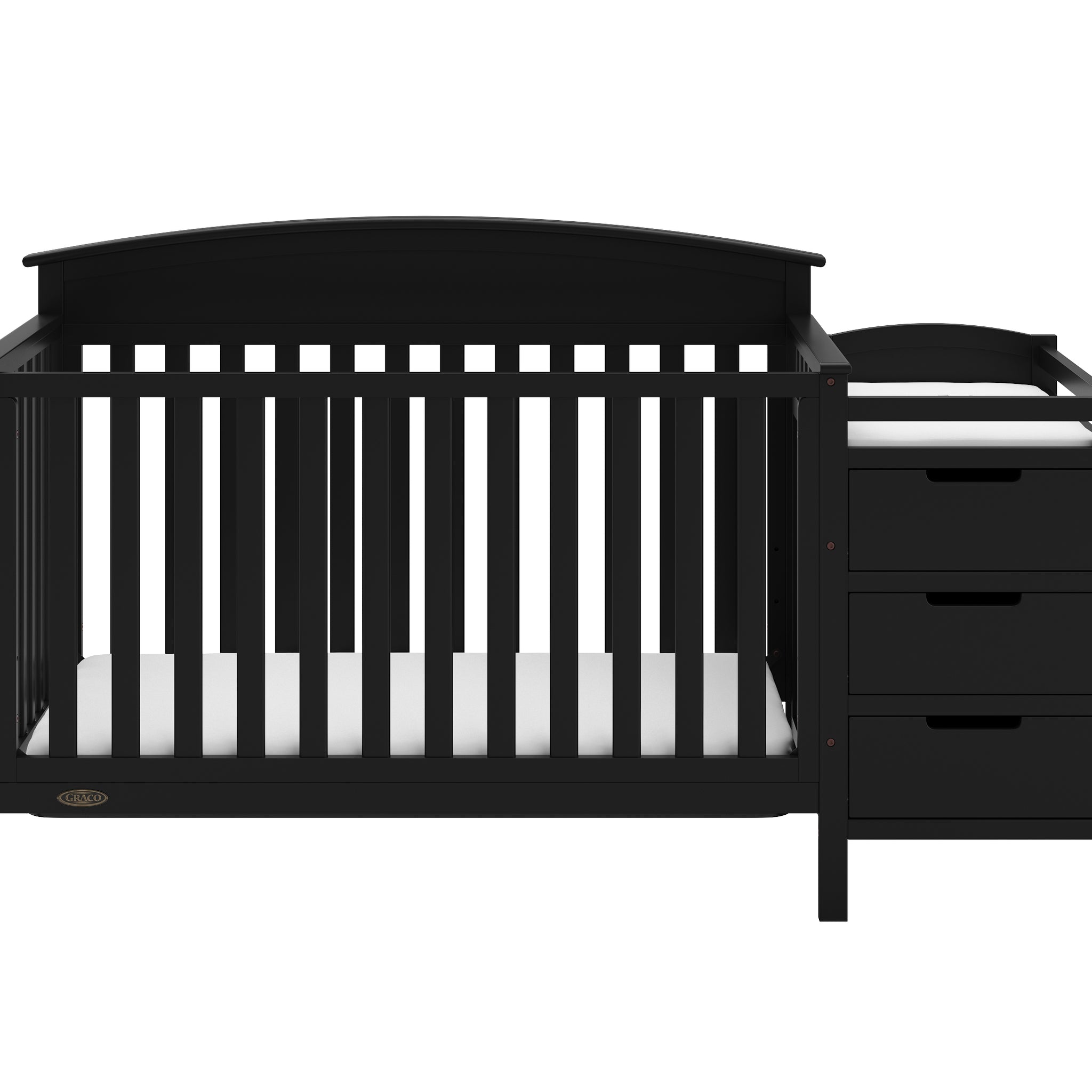Close-up view of black crib and changer