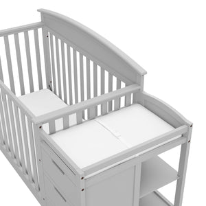 Front view of Pebble gray crib and changer