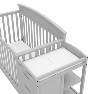Front view of Pebble gray crib and changer