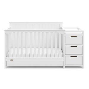 Front view of White crib with drawer and changer with drawer