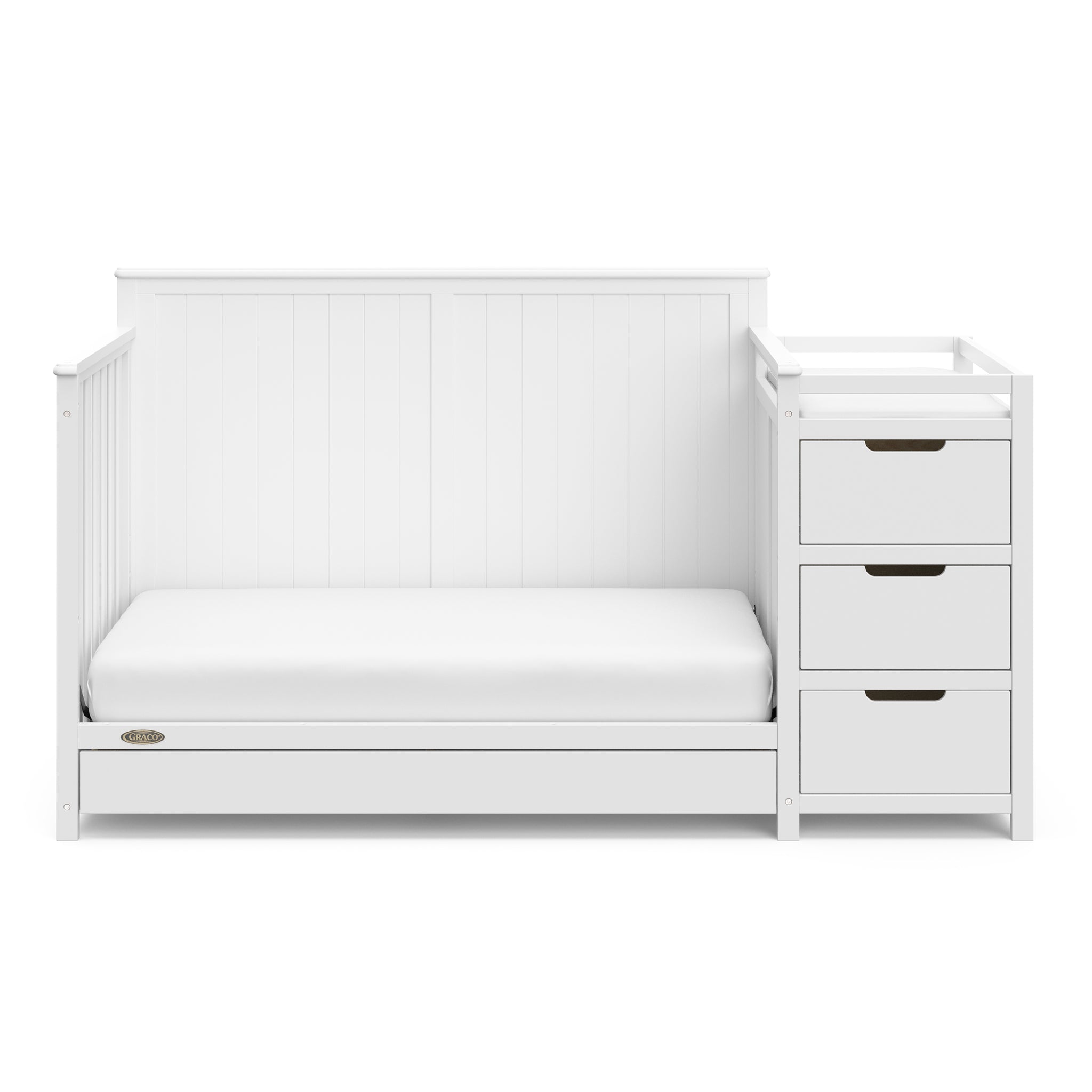 White crib and changer with drawer in toddler bed conversion 