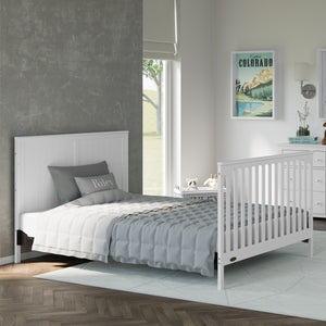 angled full-size bed metal conversion kit applied in full-size bed in nursery