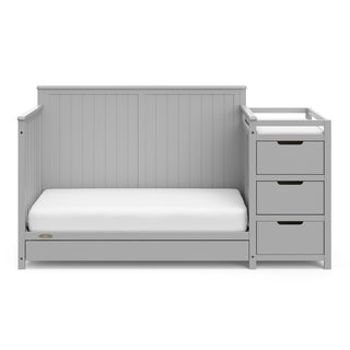 Pebble gray crib and changer with drawer in toddler bed conversion 